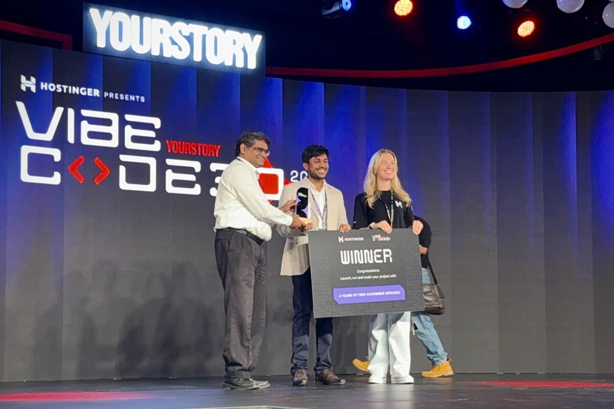 On the TechSparks stage receiving the Vibecode30 trophy